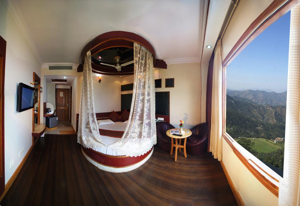 Hotel Landmark Shimla Rum bild